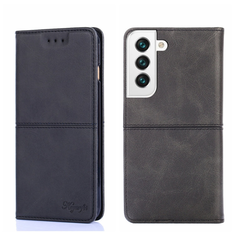Cow-texture magnetic flip phone case in dark gray, showing front cover and back camera panel