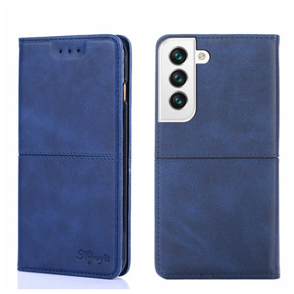 Cow-texture magnetic flip phone case in blue, showing front cover and back camera panel
