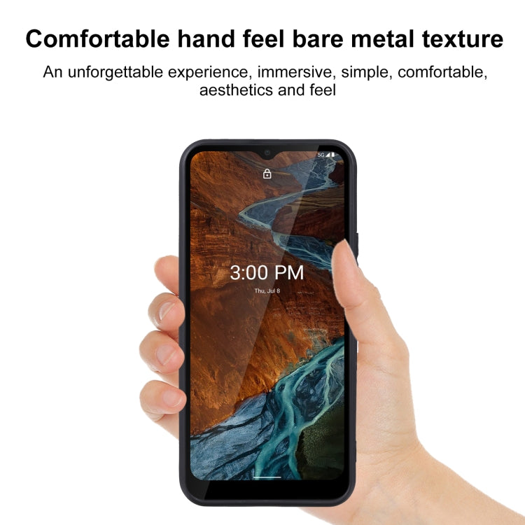 Clear TPU phone case with black edges, held in hand over a smartphone
