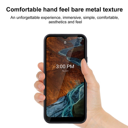 Clear TPU phone case with black edges, held in hand over a smartphone