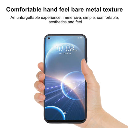 TPU phone case in hand, slim clear cover with button and camera cutouts