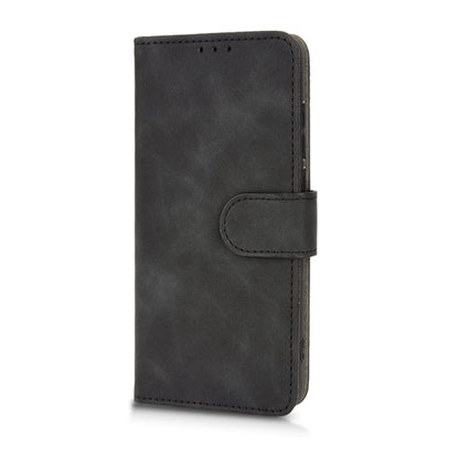 Black flip leather phone case with side magnetic strap and stitched closure panel.