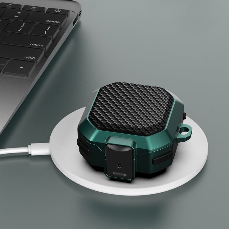 Teal carbon-fiber earbud case with snap switch cover and protective bumper edges