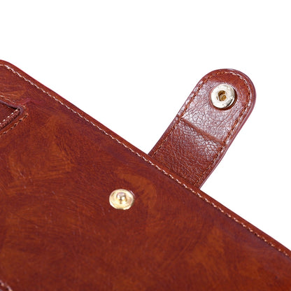 Brown leather zipper phone case strap and metal snap detail