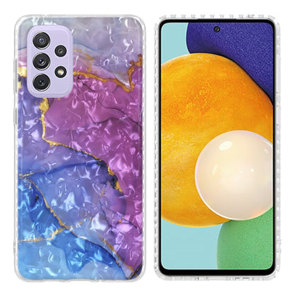 TPU phone case with purple and blue marble pattern, raised edges, camera cutouts