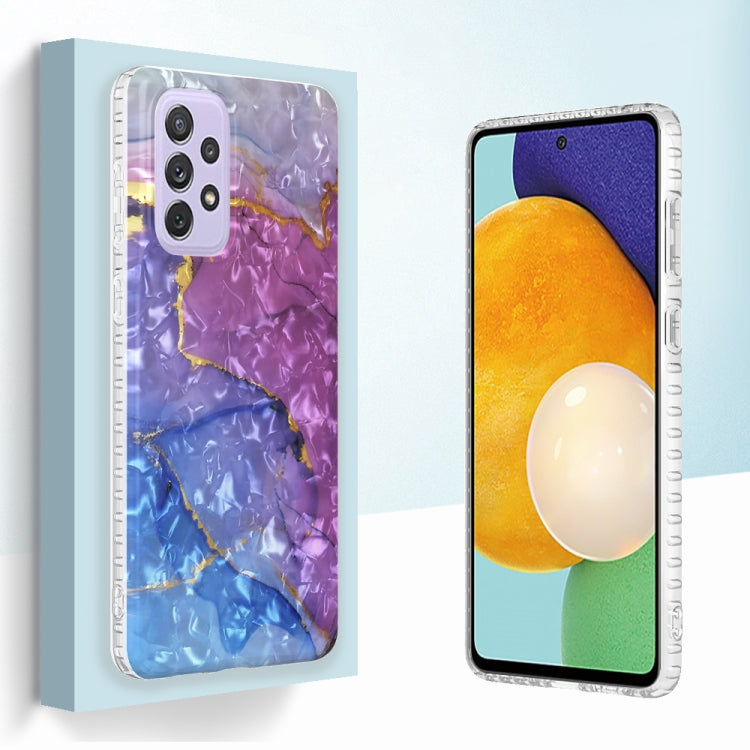 TPU phone case showing back and front view with purple/blue marble design and camera cutouts