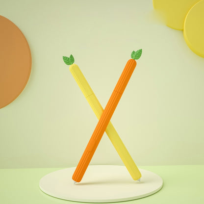 Two fruit-shaped silicone stylus protective cases, yellow and orange, on stand