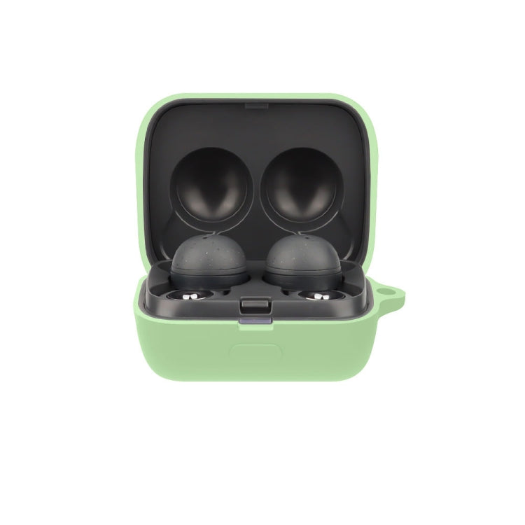 Silicone earphone protective case with open lid, holding two earbuds—matcha green.
