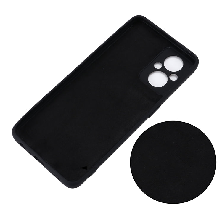 Shockproof black phone case with camera cutouts, plus included screen protector