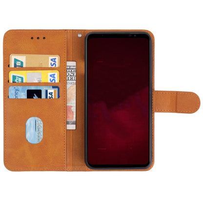 Brown leather flip wallet phone case with card window and protective inner cover.
