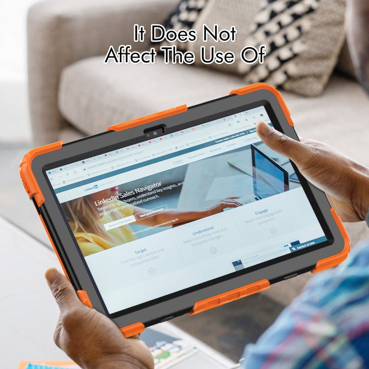 Orange rugged tablet case with hand strap, protecting a tablet in use