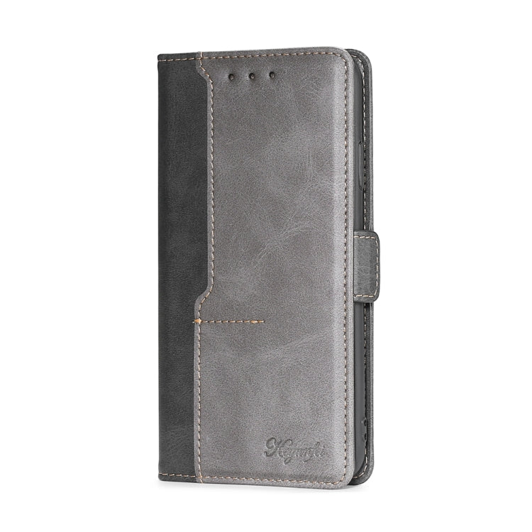 Grey leather phone case with side buckle and contrast seam details
