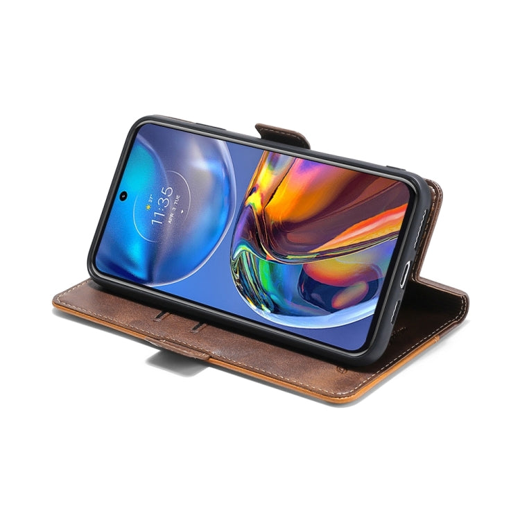 Brown leather phone case with side buckle, phone stand view and stitched edges