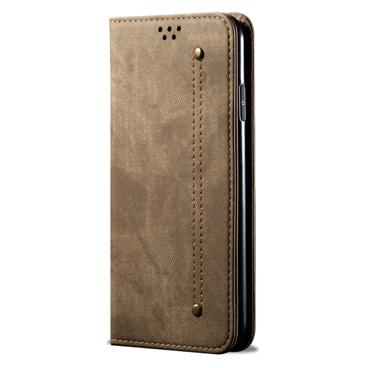 Khaki denim-texture leather phone case with vertical stitching and button closure.
