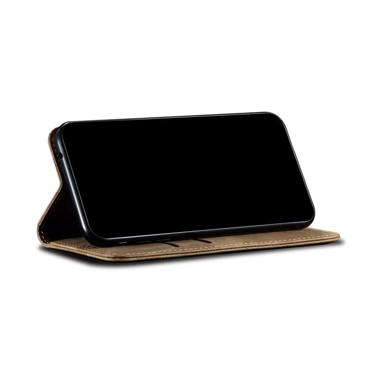 Khaki denim-texture leather phone case with front flap covering touchscreen.