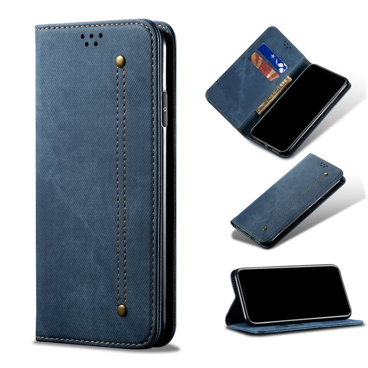 Blue denim-texture leather phone case with magnetic flap and card pocket detail.