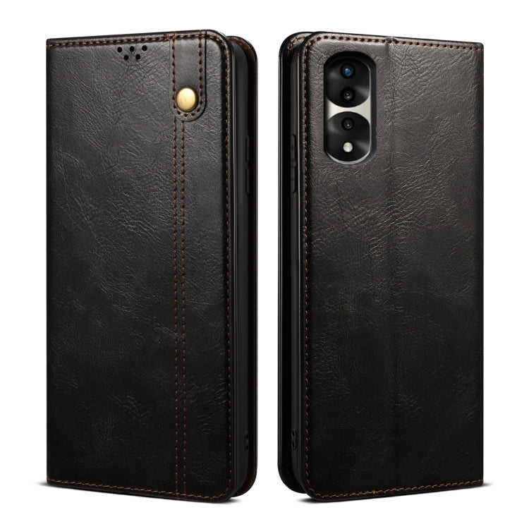 Black textured leather phone case with magnetic clasp, stitched edges, and camera cutout