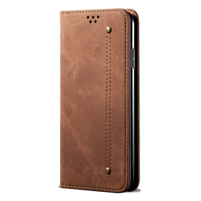 Brown denim-texture flip phone case, side view with snap button and stitching.
