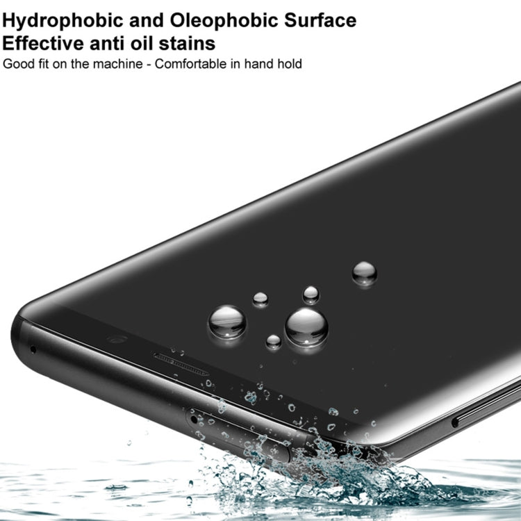 Curved tempered glass screen protector with water-repellent surface and droplets