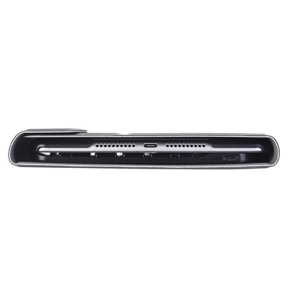 Black keyboard case underside showing port openings and charging slots