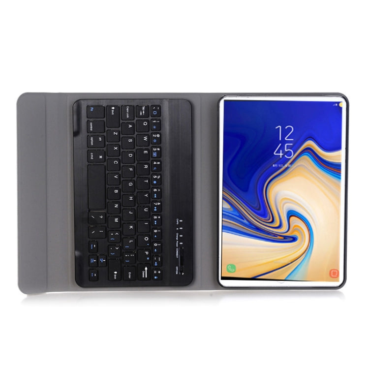 Black keyboard case holding a tablet with blue screen and connected keyboard