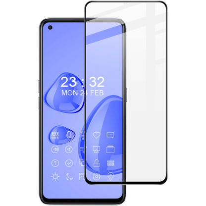 IMAK tempered glass screen protector film aligned on a blue smartphone front