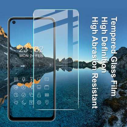 Smartphone with clear tempered glass film protector applied over the display