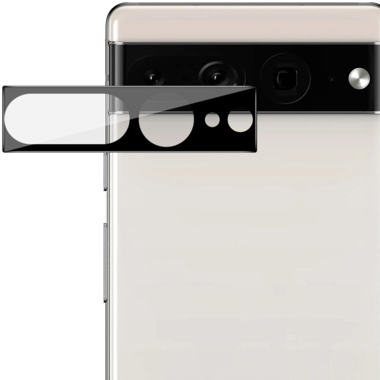 Black rear camera lens glass film, aligned overlay positioned across the camera module