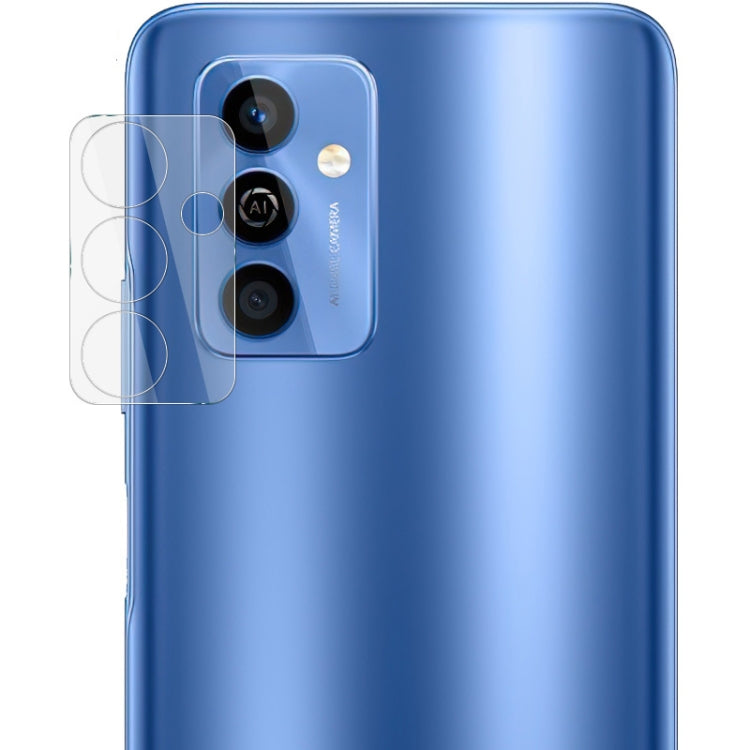 Integrated rear camera lens glass film covering the phone’s camera module on a blue back