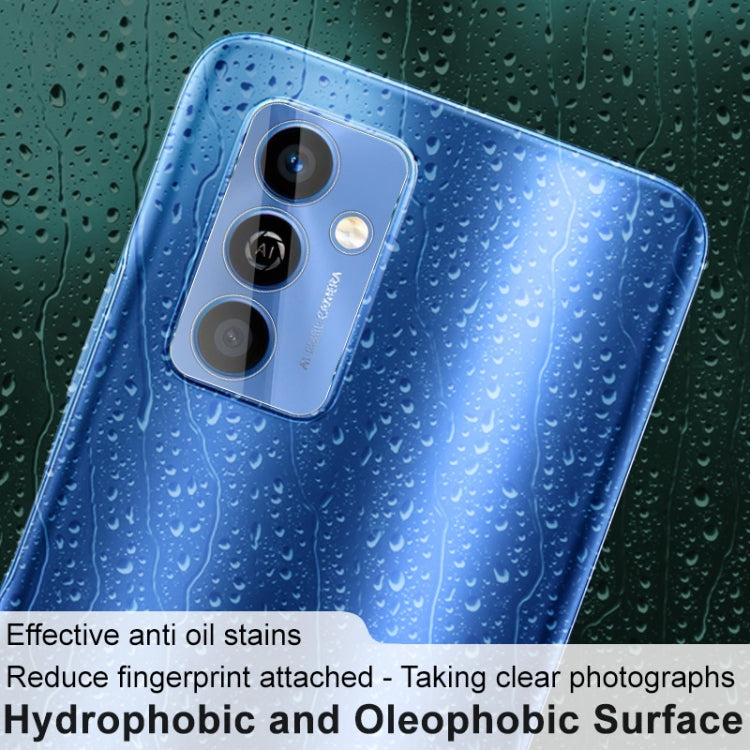 Clear hydrophobic rear camera lens tempered glass film fitted on a blue phone back