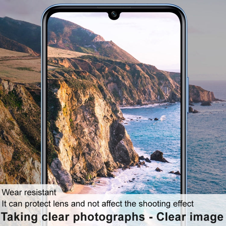 Rear camera lens glass film installed on a phone, featuring clear protection over lenses