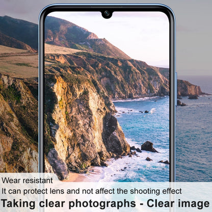 Rear camera lens glass film installed on a phone, featuring clear protection over lenses