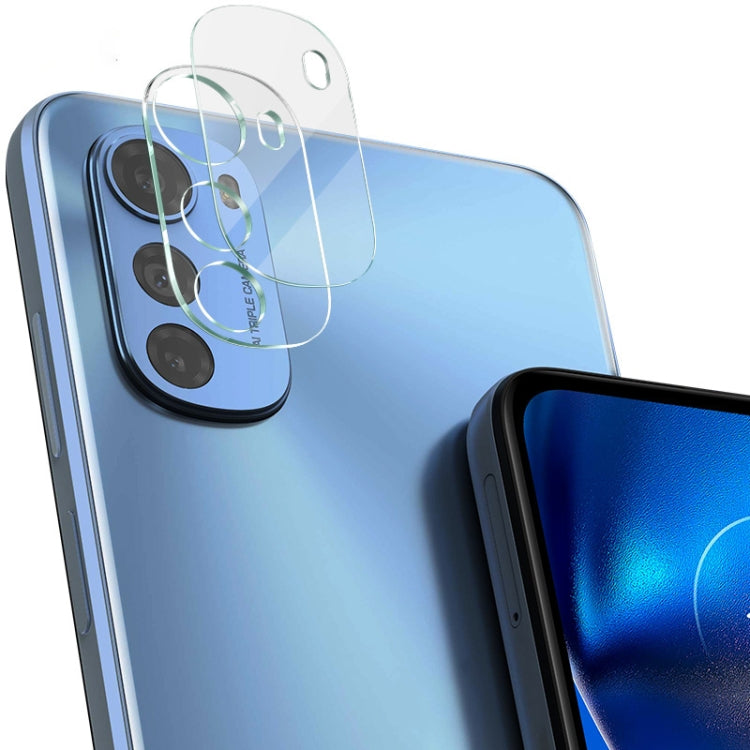 Integrated rear camera lens film with clear glass covers on a blue phone back