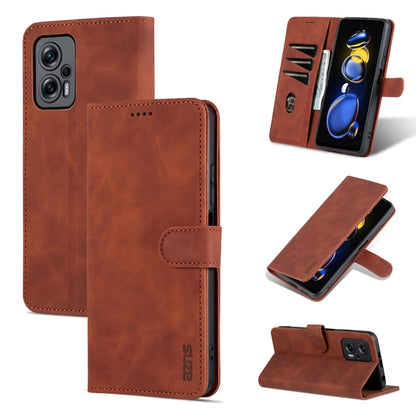 Brown flip leather phone case with folio cover and stand, stitched edges, cutout camera area