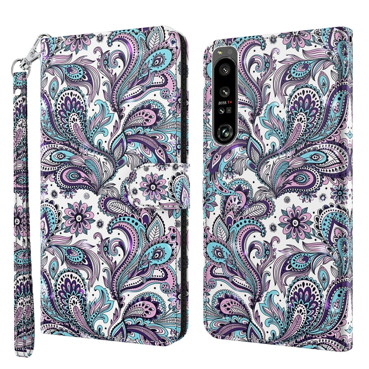 White paisley flip phone case with purple and teal pattern and wrist strap