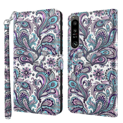White paisley flip phone case with purple and teal pattern and wrist strap