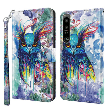 Blue watercolor owl flip phone case with multicolor paint splashes and wrist strap