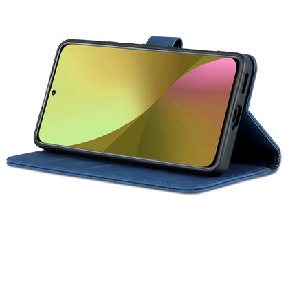 Blue flip leather phone case holding phone in landscape stand view