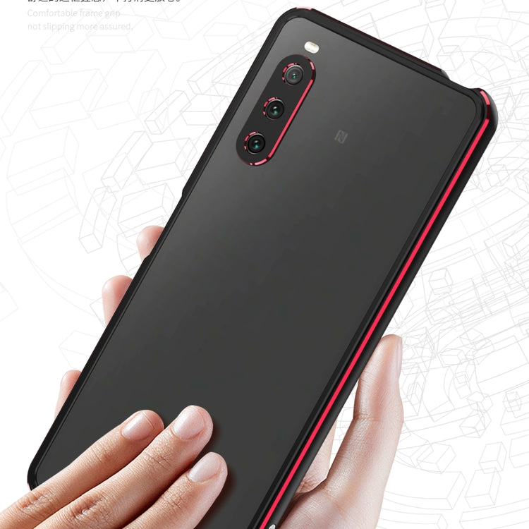 Protective phone case with lens protector, black back with red trim and metal frame on phone