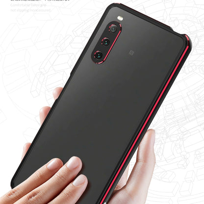 Protective phone case with lens protector, black back with red trim and metal frame on phone
