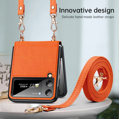 Orange litchi-texture phone case with leather-look strap and coiled lanyard