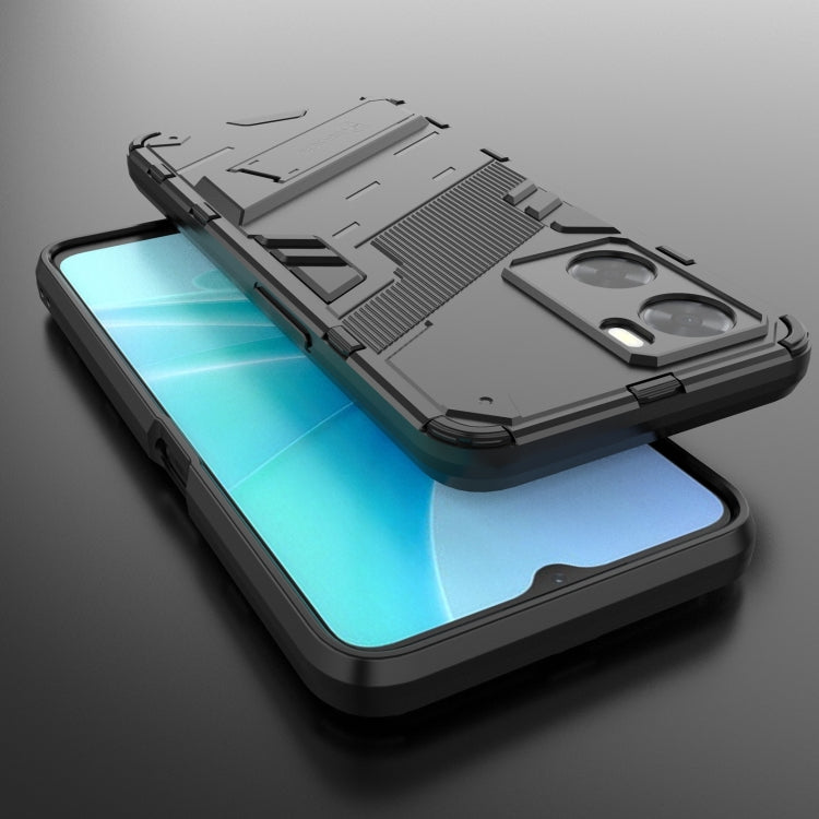 Rugged phone case with flip kickstand style holder attached to the back