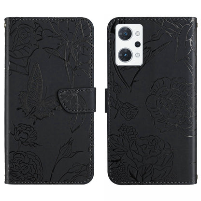 Black butterfly embossed flip leather phone case with strap and dual camera cutouts