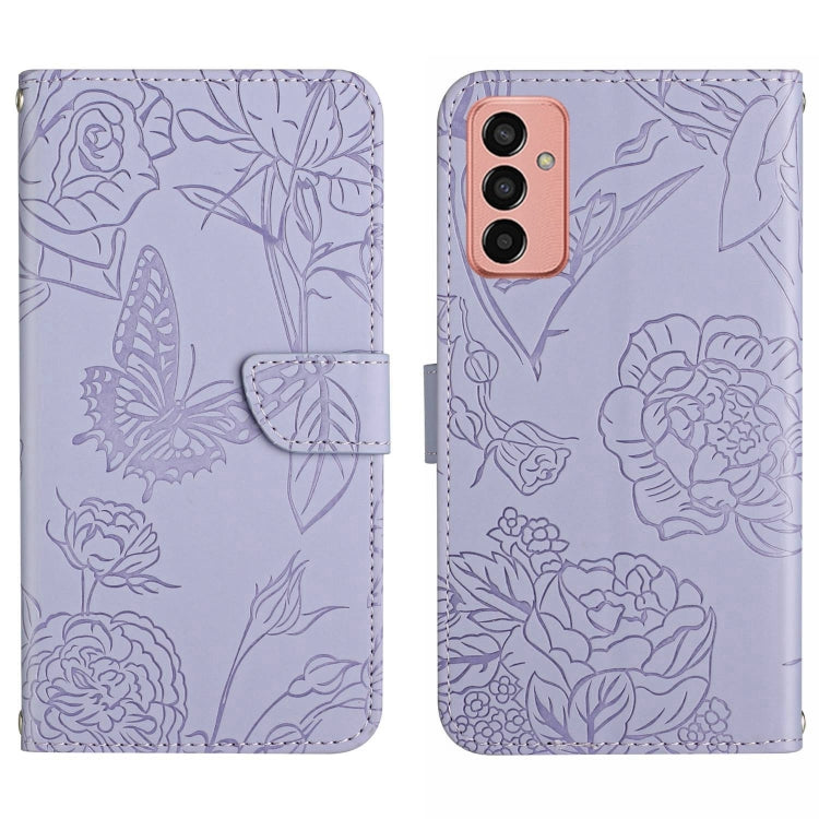 Purple butterfly embossed flip leather phone case with strap and triple camera cutouts