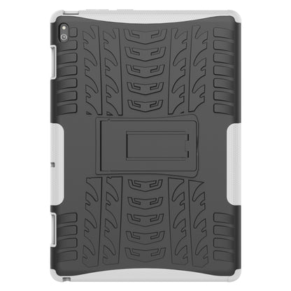 Rugged tablet case with tire texture, dark gray/black back panel and holder