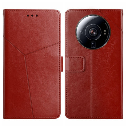 Red leather flip phone case with diagonal seam, camera cutout, and recessed card pocket