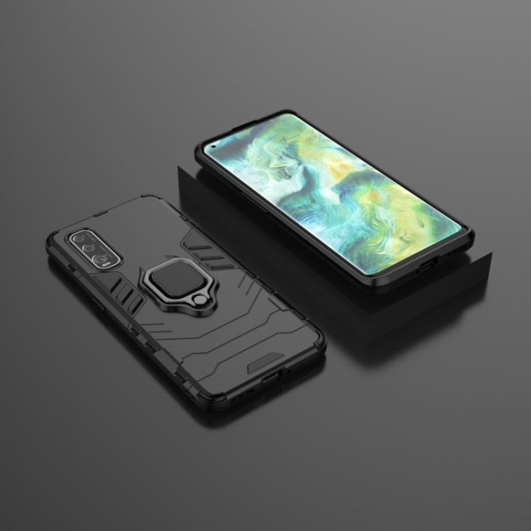 Rugged dark phone case with magnetic ring holder, angled back view