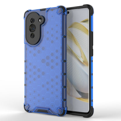 Shockproof honeycomb phone case in blue with hex pattern, raised corners, and camera cutouts