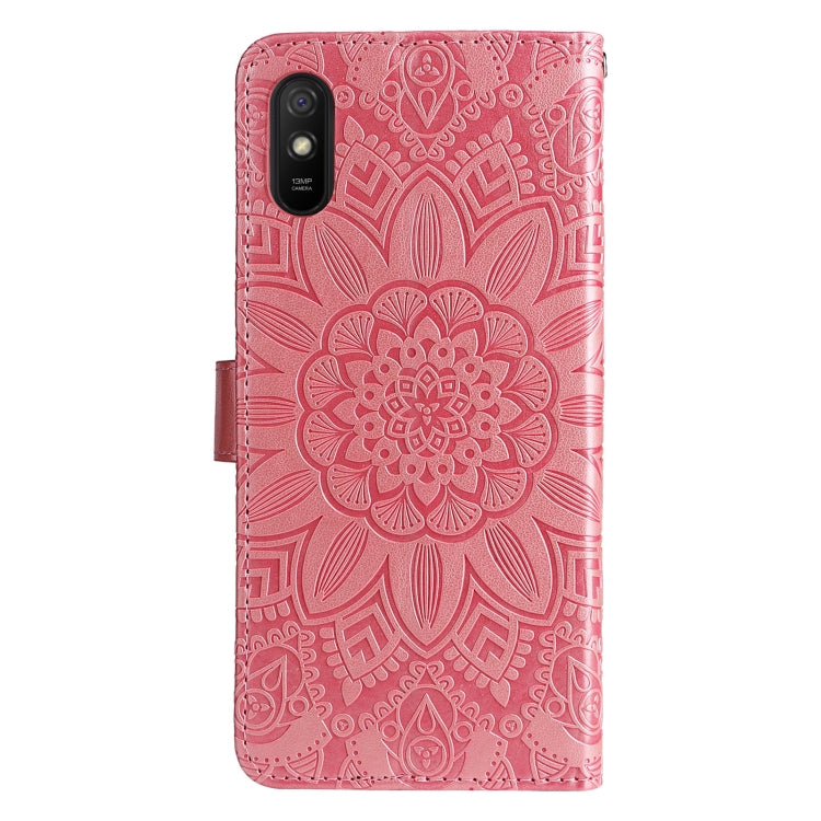 Pink embossed sunflower leather-look phone case, textured back with camera cutout