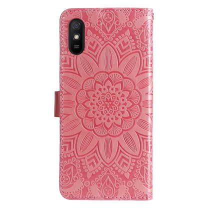Pink embossed sunflower leather-look phone case, textured back with camera cutout